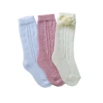 Calze lunghe traforate ponpon